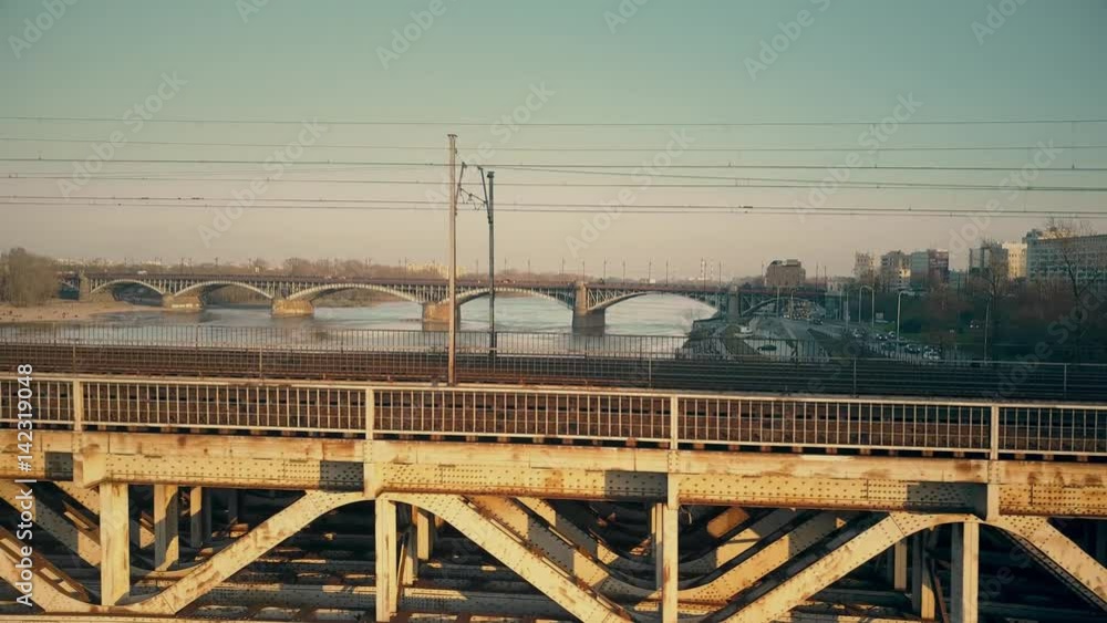 Aerial shot of old steel railway bridge across the river. 4K video Aerial shot of old steel railway bridge across the river. 4K video