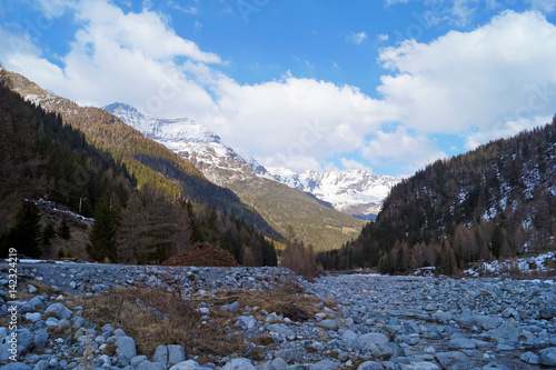 Panorama di montagna con vista pizzo delle Tre Mogge cielo azzurro e nuvole bianche photo