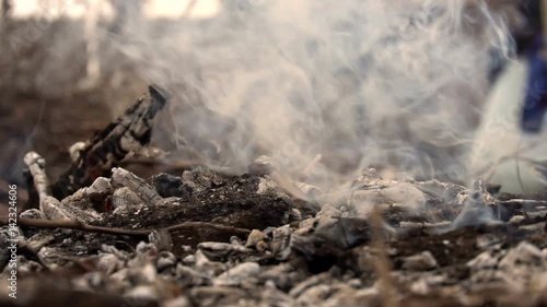 Wallpaper Mural Smoldering remains from the campfire. Slow motion Torontodigital.ca
