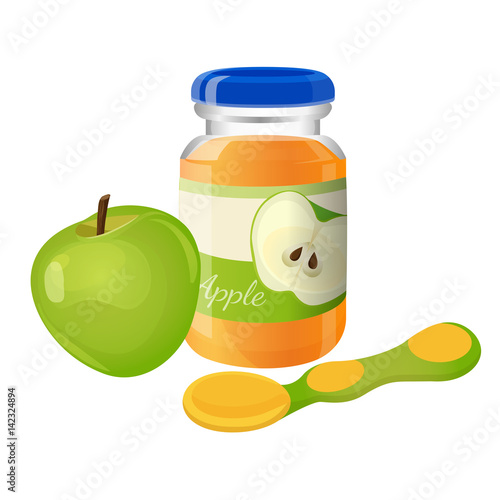 Glass jar of puree with spoon and green apple near