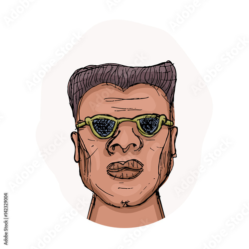 African-American man in glasses with a harsh face expression.