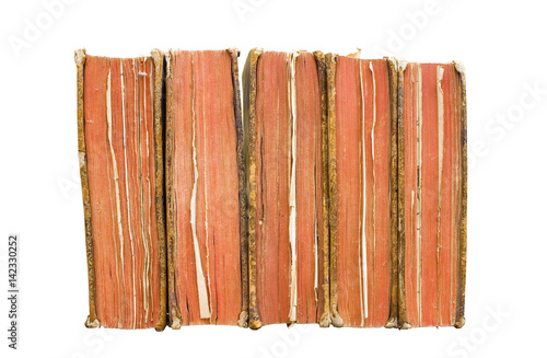 very old books in a row, isolated on white background
