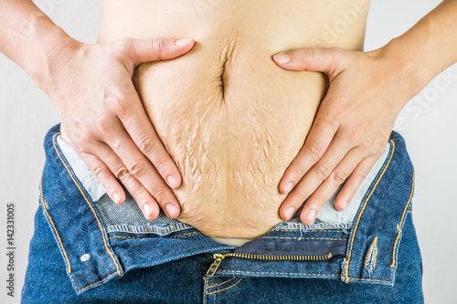 woman with Belly pattern blue jeans 
