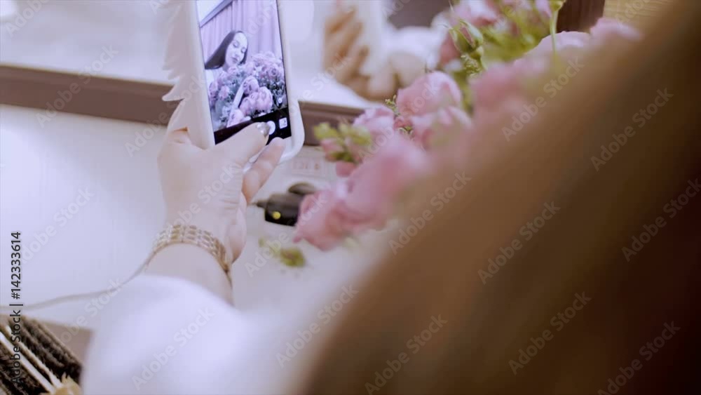 The girl is photographed with flowers. The girl is photographed with flowers.