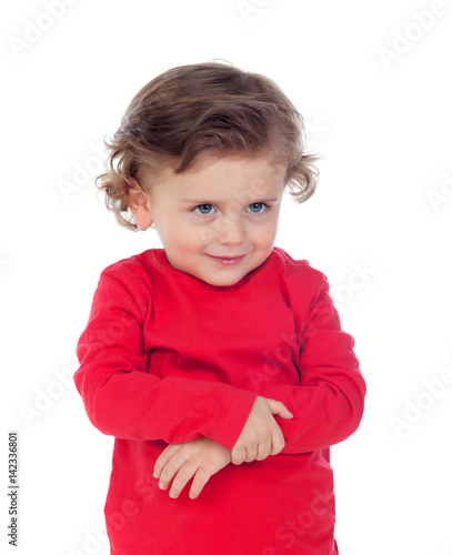 Adorable baby with curly hair playing to hugging