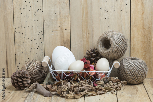 Easter eggs on wooden backg...