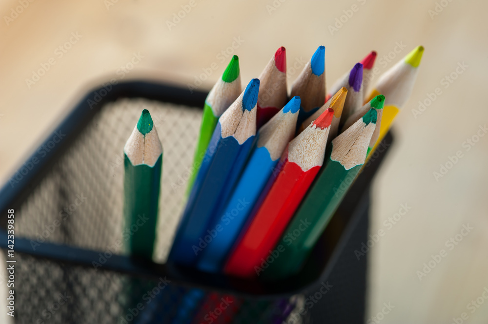 Group of sharpened wooden crayons as a background Group of sharpened wooden crayons as a background