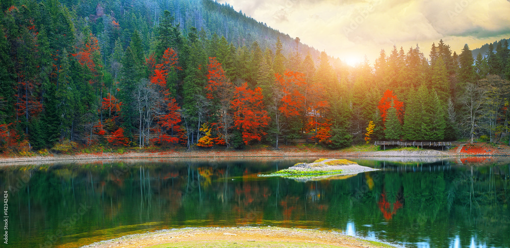 picturesque lake in the autumn forest picturesque lake in the autumn forest
