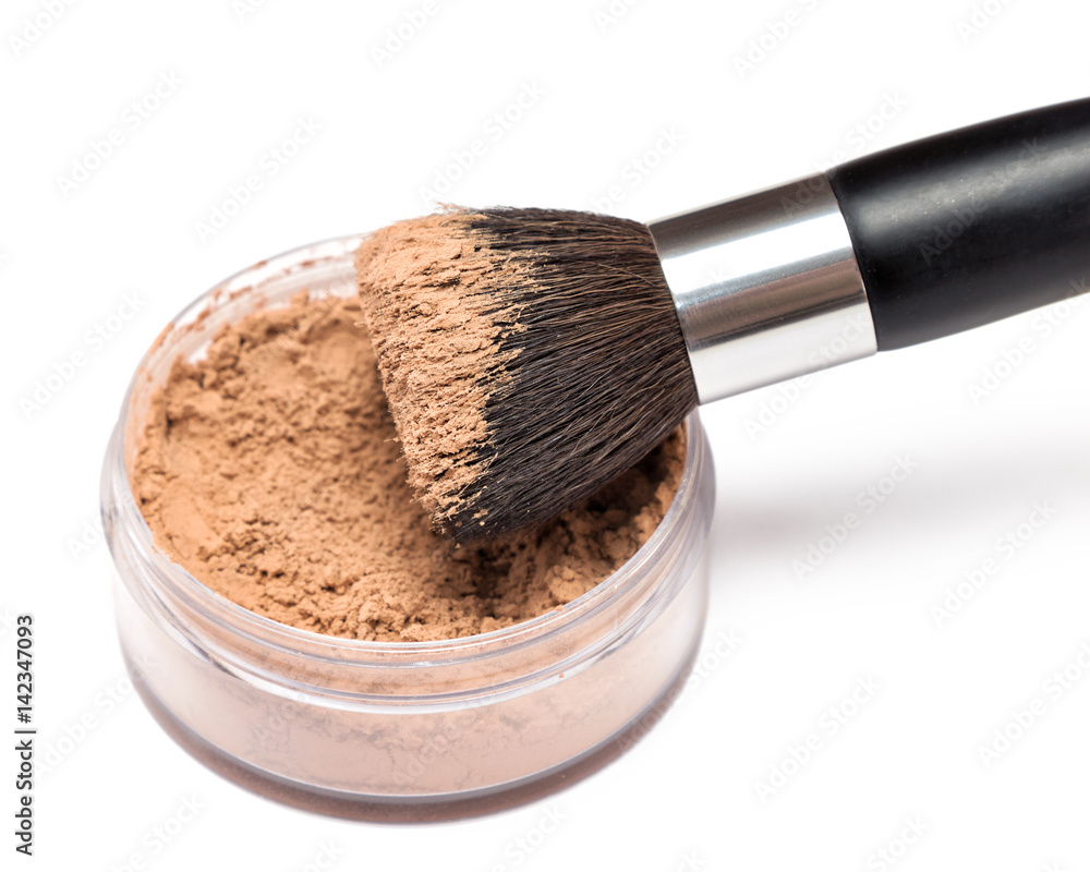 Make-up brush with jar of loose cosmetic powder Make-up brush with jar of loose cosmetic powder