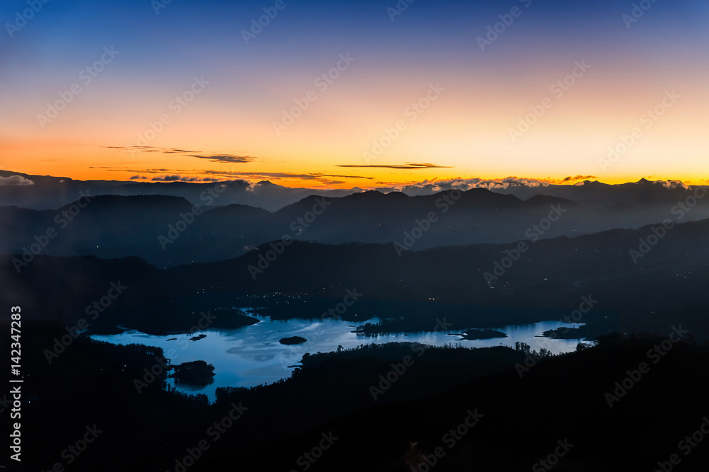 Sri Lankan mountains and Maskeliya reservoir. Amazing sunrise at Adam's Peak, or Sri Pada, sacred buddhist place. Sri Lankan mountains and Maskeliya reservoir. Amazing sunrise at Adam's Peak, or Sri Pada, sacred buddhist place.