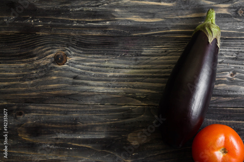 Fresh vegetables on a wooden background. Healthy food.