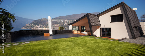 Modern villa, exterior with lawn, nobody
