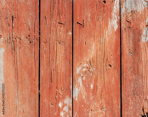 Wood texture. Red painted old door