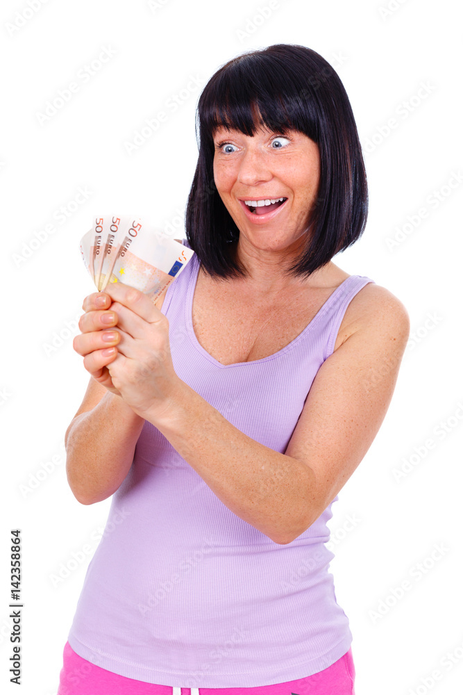 Rich woman. Brunette mature woman with surprised sight and white smiled, holding cash euro money banknotes in hand, isolated on white background, Positive human emotion, facial expression Rich woman. Brunette mature woman with surprised sight and white smiled, holding cash euro money banknotes in hand, isolated on white background, Positive human emotion, facial expression