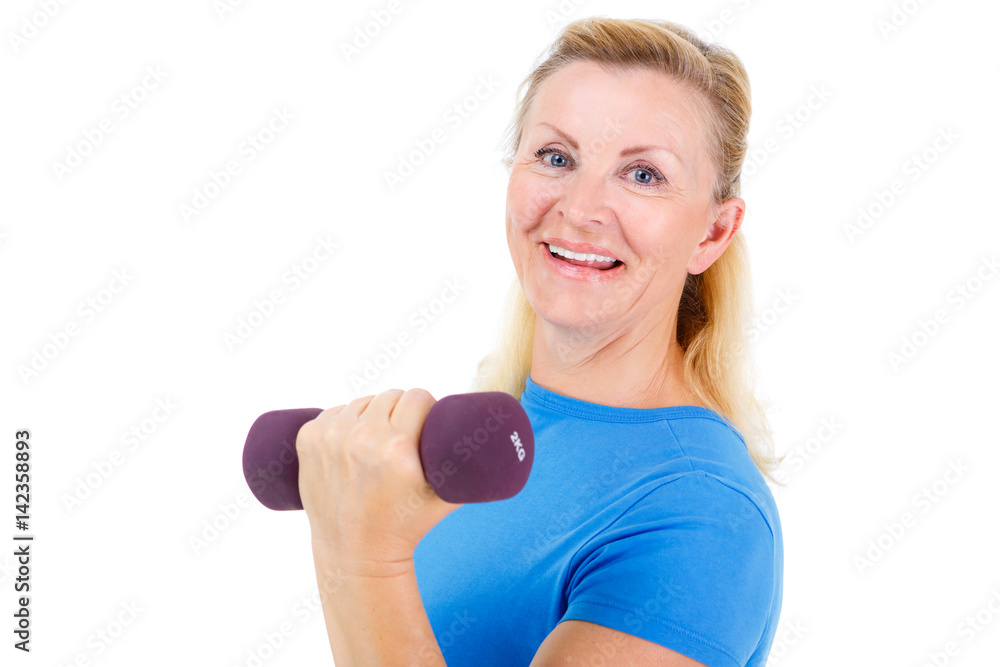Pensioner woman sport. Old senior woman dressed in blue t-shirt. Woman looking at camera, holding dumbbells and cheerfully smiling while doing sport exercises. isolated on white background Pensioner woman sport. Old senior woman dressed in blue t-shirt. Woman looking at camera, holding dumbbells and cheerfully smiling while doing sport exercises. isolated on white background