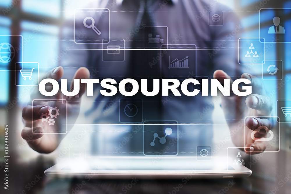 Businessman using tablet pc and selecting outsourcing. Businessman using tablet pc and selecting outsourcing.