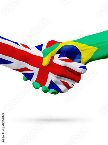 Flags United Kingdom, Brazil countries, partnership friendship handshake concept. photo