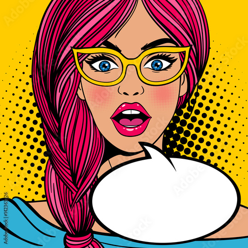 Wow pop art female face. Sexy surprised young woman in glasses with open mouth and pink hair and empty speech bubble. Vector bright background in pop art retro comic style.