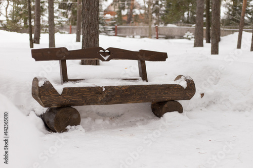 Wallpaper Mural wooden bench in winter park Torontodigital.ca