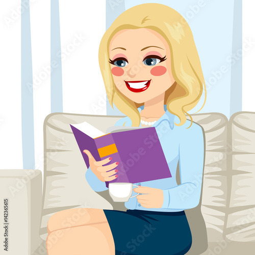 Beautiful blonde senior woman reading book relaxing on sofa drinking coffee