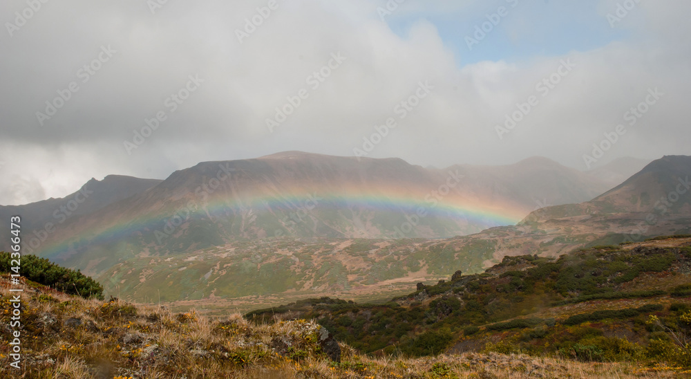 Rainbow over the valley in Kamchatka