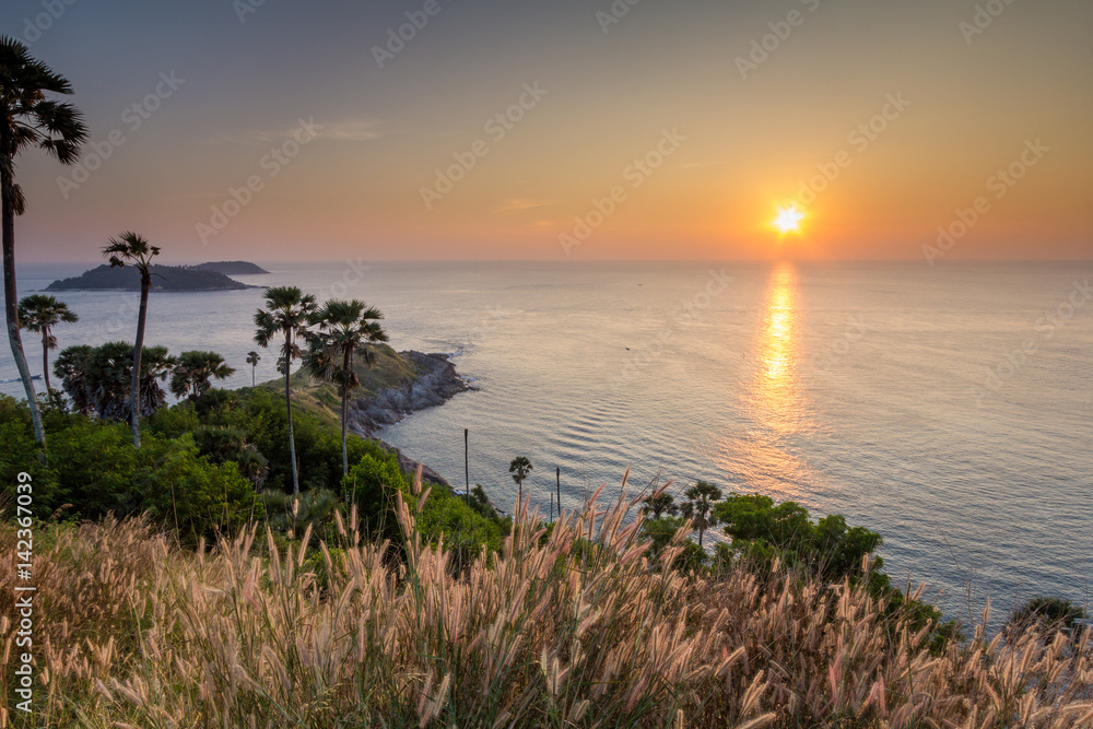 Beautiful sunset with the clear sky at Prom Thep Cape, Phuket Thailand
