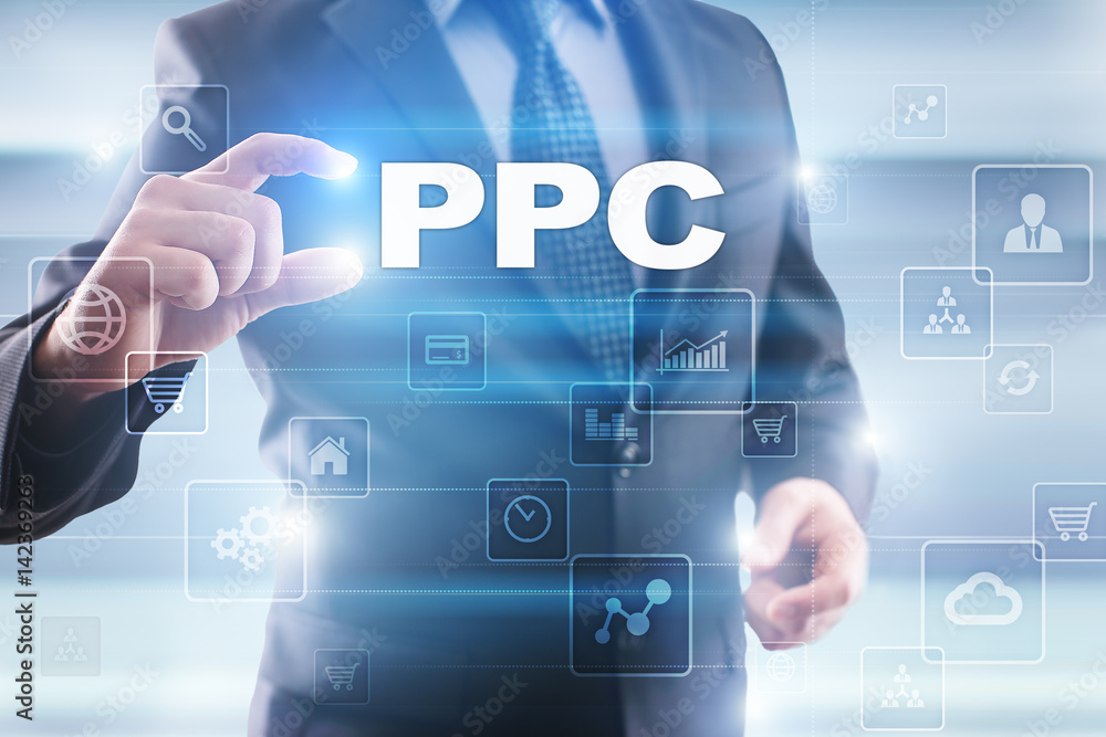Businessman selecting ppc on virtual screen. Businessman selecting ppc on virtual screen.