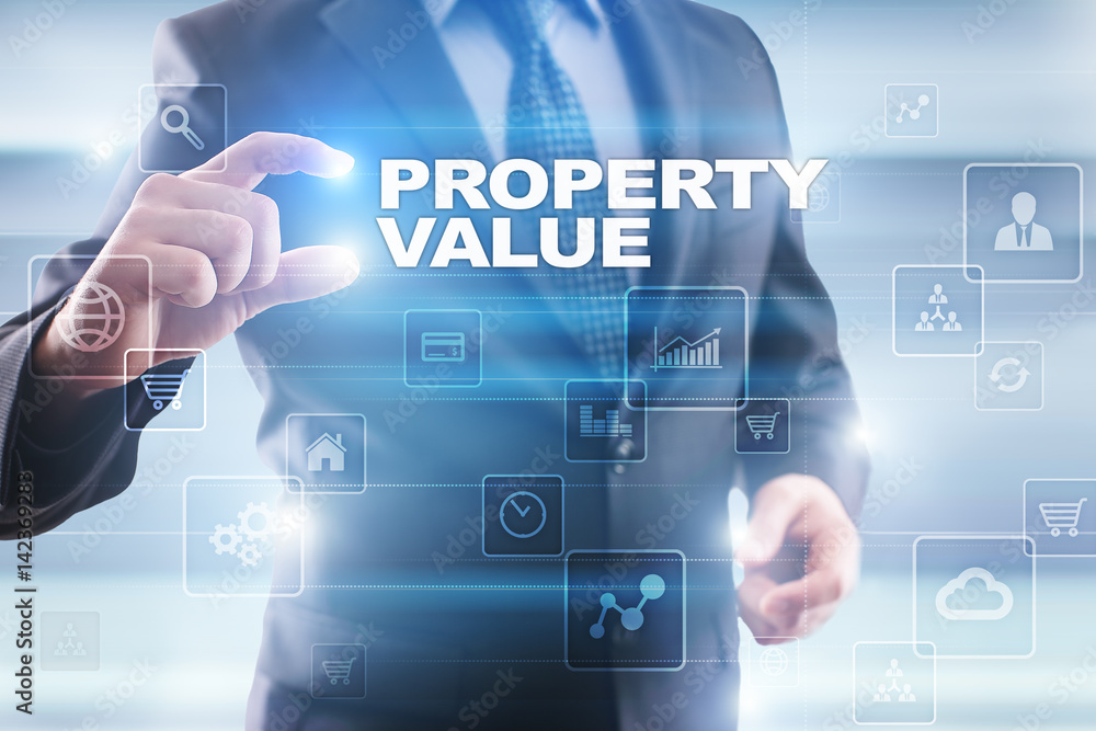 Businessman selecting property value on virtual screen. Businessman selecting property value on virtual screen.