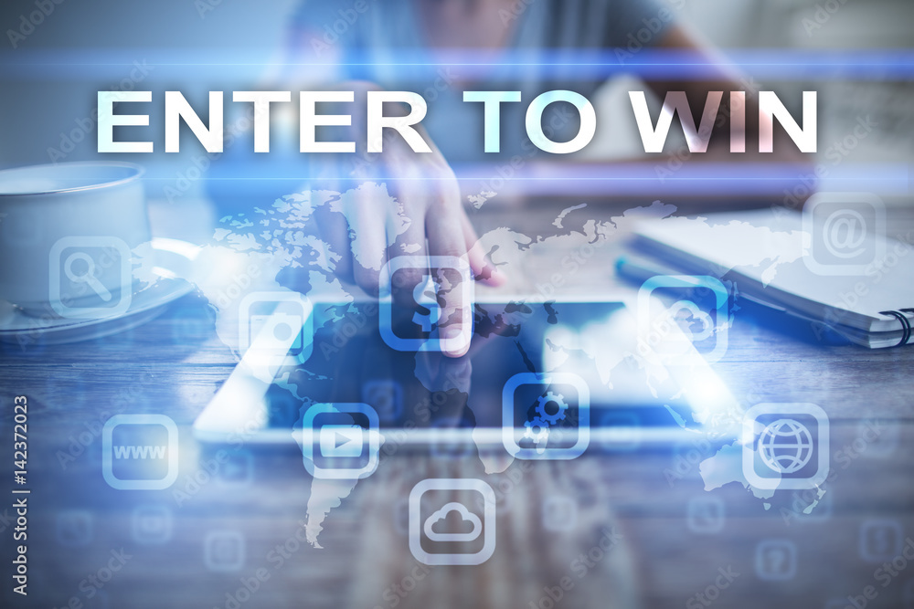 Woman using tablet pc, pressing on virtual screen and selecting enter to win. Woman using tablet pc, pressing on virtual screen and selecting enter to win.