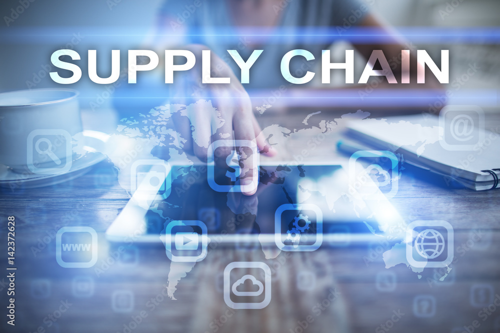 Woman using tablet pc, pressing on virtual screen and selecting supply chain. Woman using tablet pc, pressing on virtual screen and selecting supply chain.