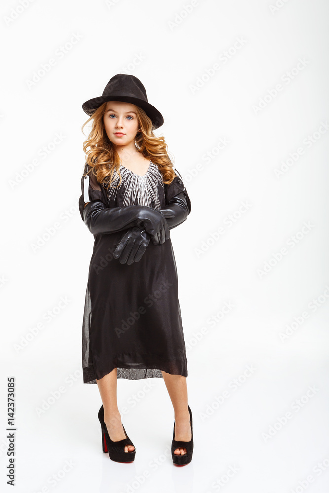 Girl in long black gloves, stands folding her arms. Girl in long black gloves, stands folding her arms.