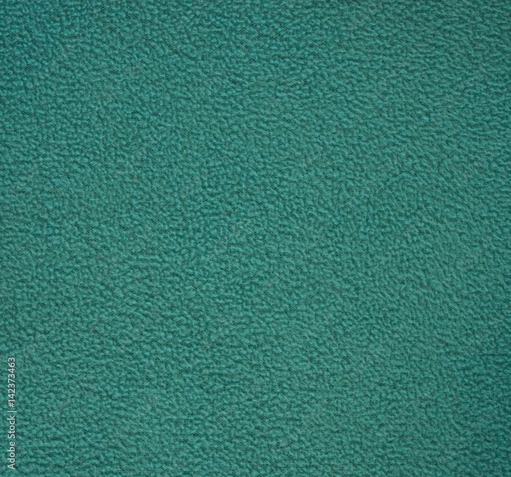 Close up green fleece texture. Background. Close up green fleece texture. Background.