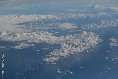 White soft clouds on idyllic blue sky © Volodymyr