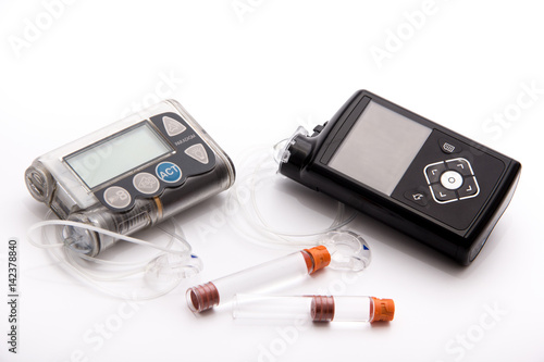 Diabetic items - Diabetes care, concept, test, monitor, background: Education about items to control diabetes: New modern Sensor-Augmented insulin pump, blood sugar meter and glucose sensor with set