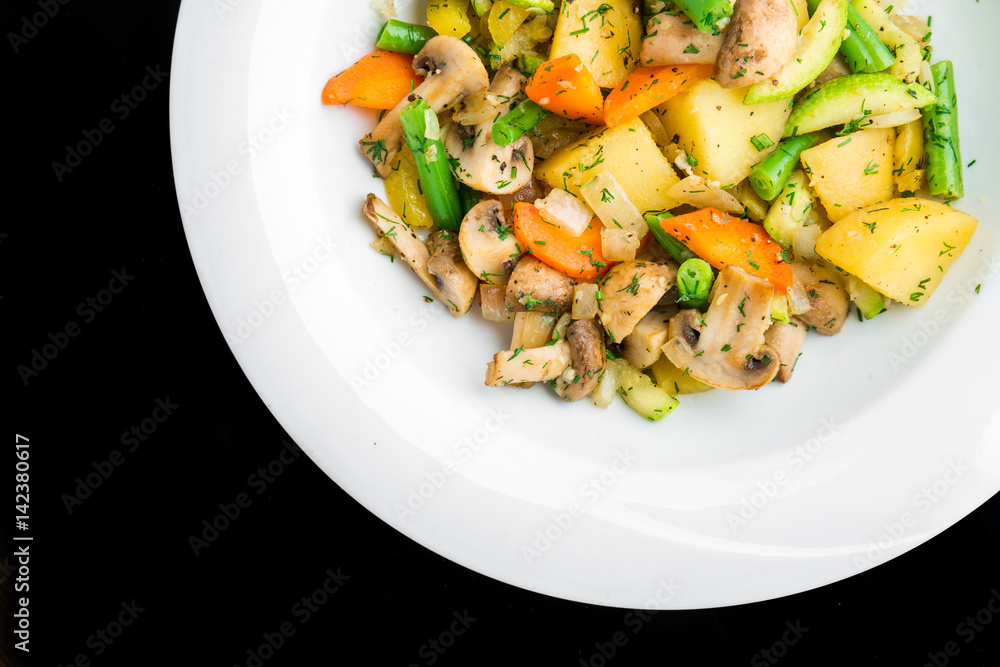 Hot salad with fried potatoes, mushrooms and asparagus Hot salad with fried potatoes, mushrooms and asparagus