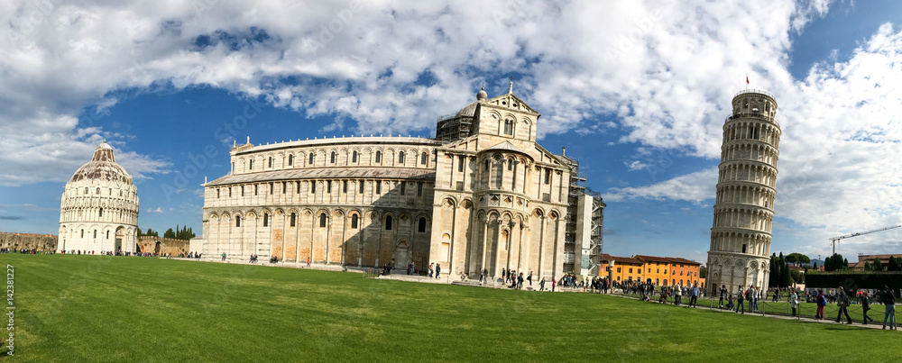 PISA - OCTOBER 10, 2016: Tourists in Square of Miracles. Pisa attracts 3 million people annually