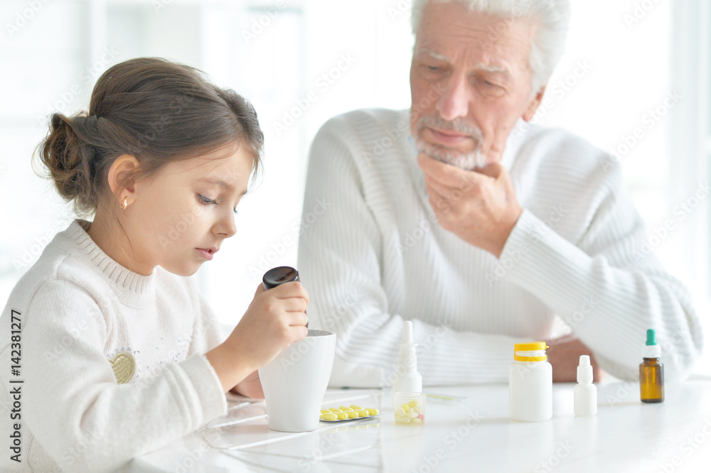 Granddaughter takes care of a sick grandfather Granddaughter takes care of a sick grandfather