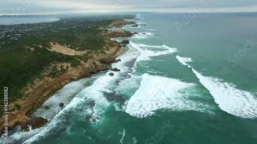 Forward flight along beautiful rugged coastline near Sorrento Ocean Beach. Mornington Peninsula, Victoria, Australia