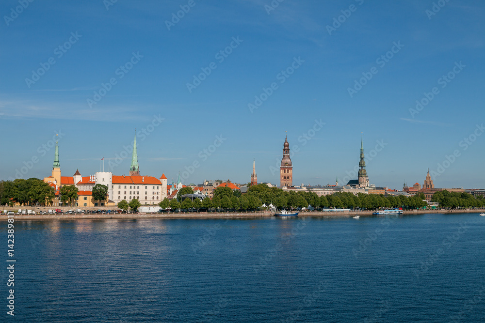 Old town of Riga summer day skyline with Daugava river
