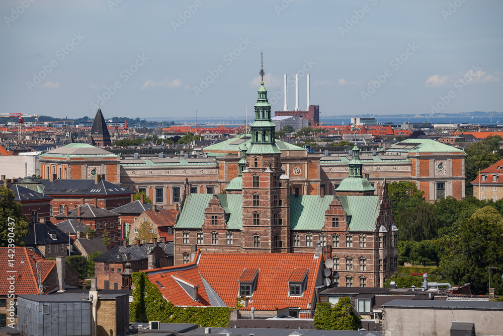 Cityscape of Copenhagen from the Round Tower. City center roofs and Rosenborg castle