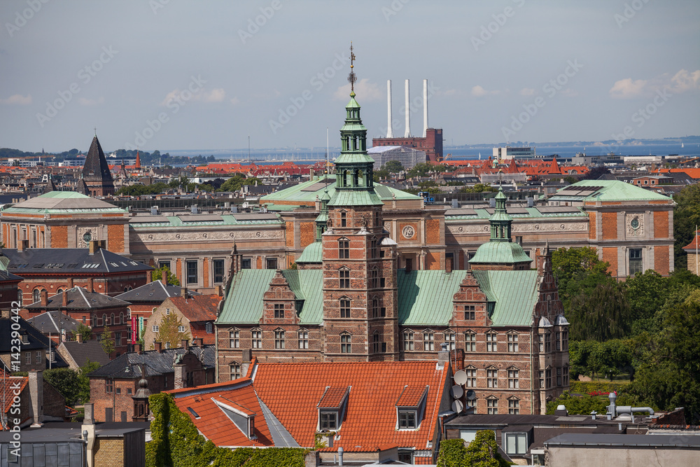 Fototapeta premium Cityscape of Copenhagen from the Round Tower. City center roofs and Rosenborg castle