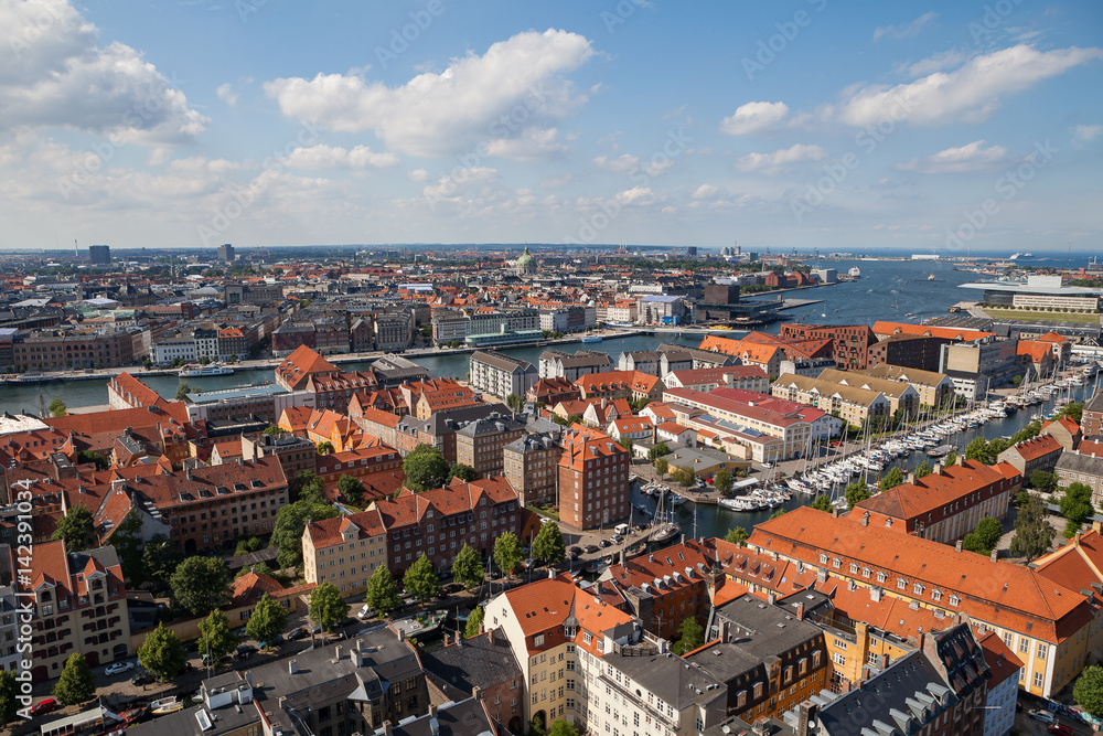 Aerial view of Copenhagen red roofs and canal. Christianshavn and central district