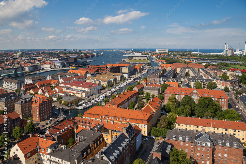 Aerial view of Copenhagen red roofs and canal. Christianshavn and central district
