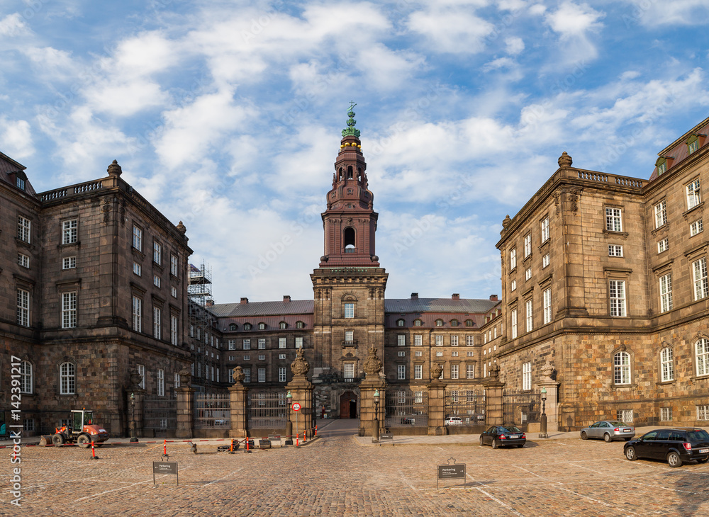 COPENHAGEN, DENMARK - 26 JUNE, 2016: Christiansborg Castle houses the Danish Parliament and the Royal Stables.