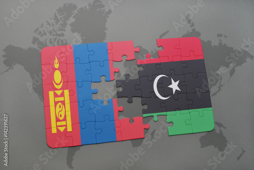 puzzle with the national flag of mongolia and libya on a world map