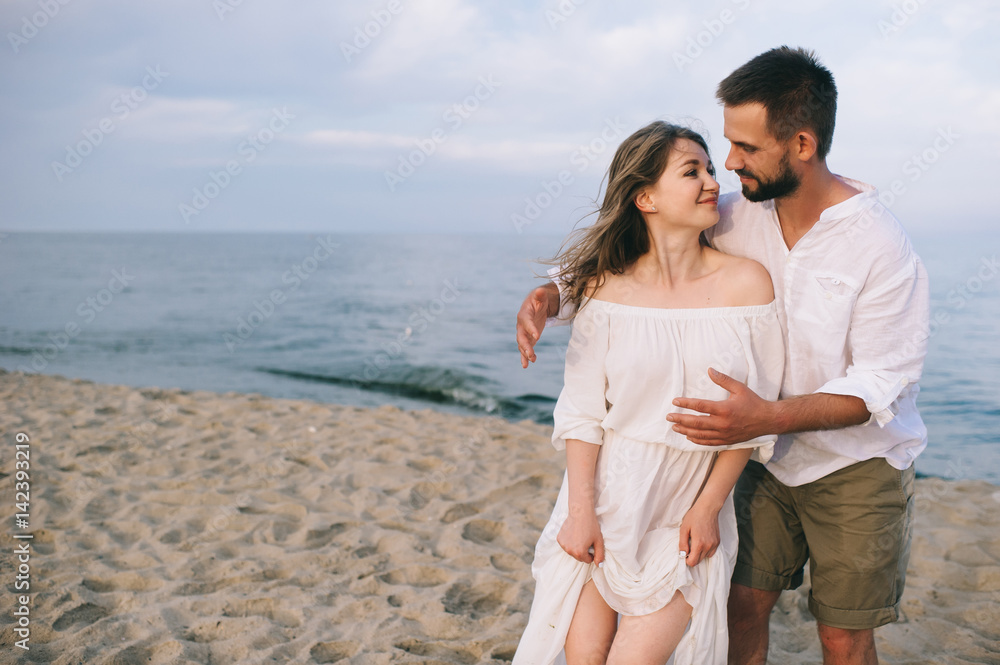 couple in love on the beach couple in love on the beach