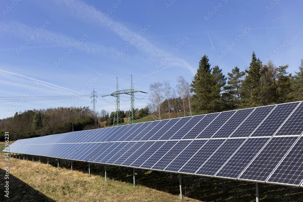Solar Power Station on the spring Meadow 