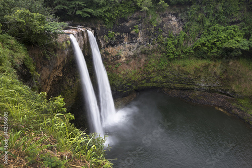 Wailua falls near the island capital Lihue on the island of Kauai  Hawaii.  Wailua Falls is most recognized in the opening credits of the long-running television show  Fantasy Island. 