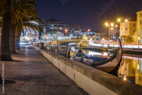 Aveiro city with the tradicional Moliceiro boat by night