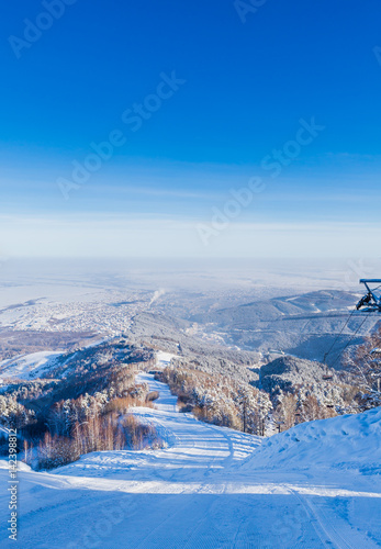 The ski slope on Tserkovka mountain in the city the resort of Belokurikha, Altai, Russia photo